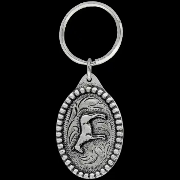 "The Big Country Custom Keychain is the perfect accessory to mix and match metals for a unique and fun design! Crafted on your choice of a German Silver, Jeweler's Bronze, or Copper base, and with the ability to choose the metal color for the scrolls